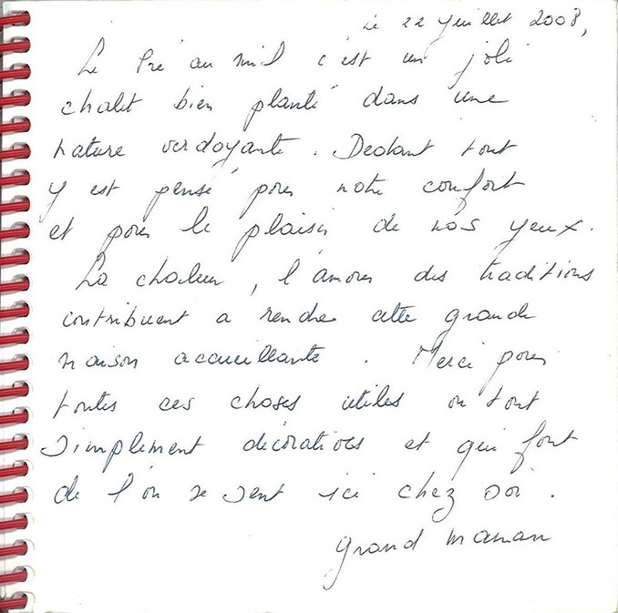 Mot manuscrit laissé par des visiteurs dans le livre d'or