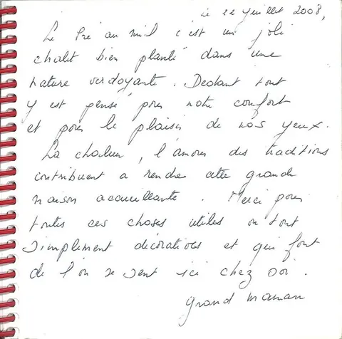 Mot manuscrit laissé par des visiteurs dans le livre d'or